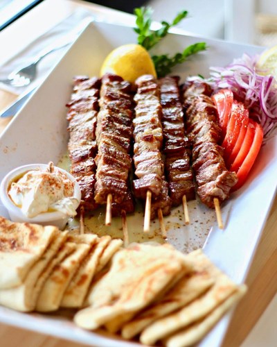 Pork souvlaki skewers with pita